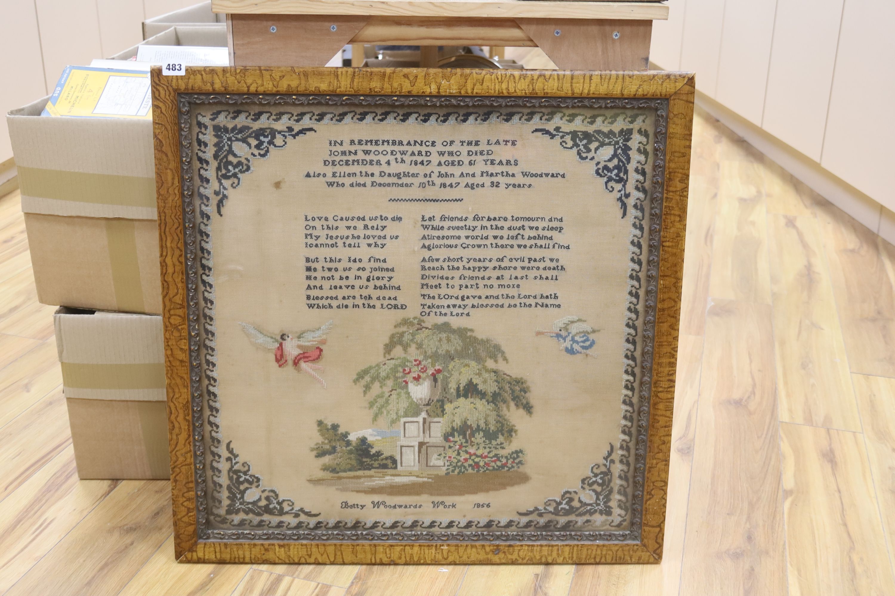 A framed 19th century 1854 woolwork sampler by Betty Woodward, 65 x 64cm